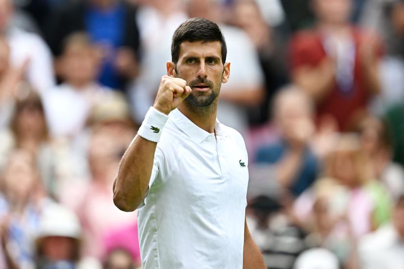 Novak Djokovic of Serbia celebrates winning match point against Pedro Cachin 