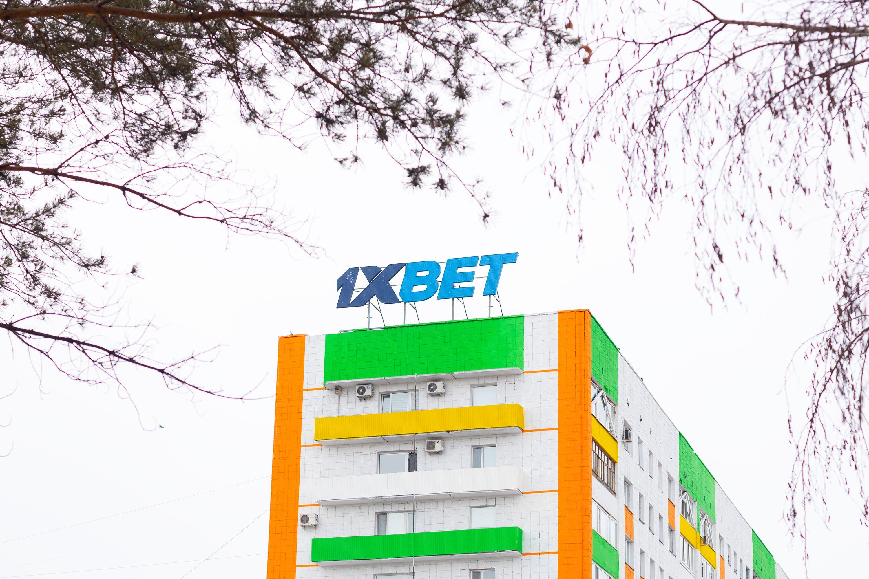 1xbet logo sign on bright colorful house building