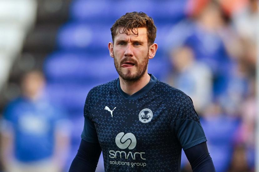 Goalkeeper Jed Steer (21 Peterborough United) is warming up during the Sky Bet League 