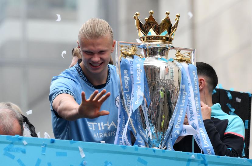 Erling Haaland of Manchester City celebrates with the Premier League 