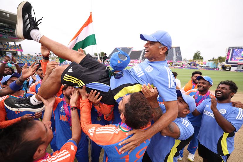 Rahul Dravid Head Coach of India is lifted up by the team 