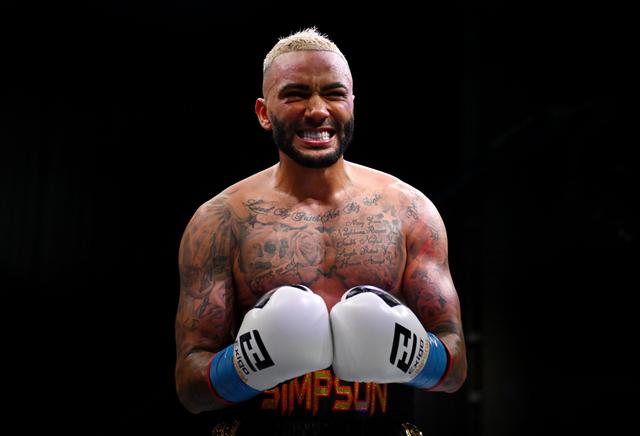 Danny Simpson reacts during the Light Heavyweight fight