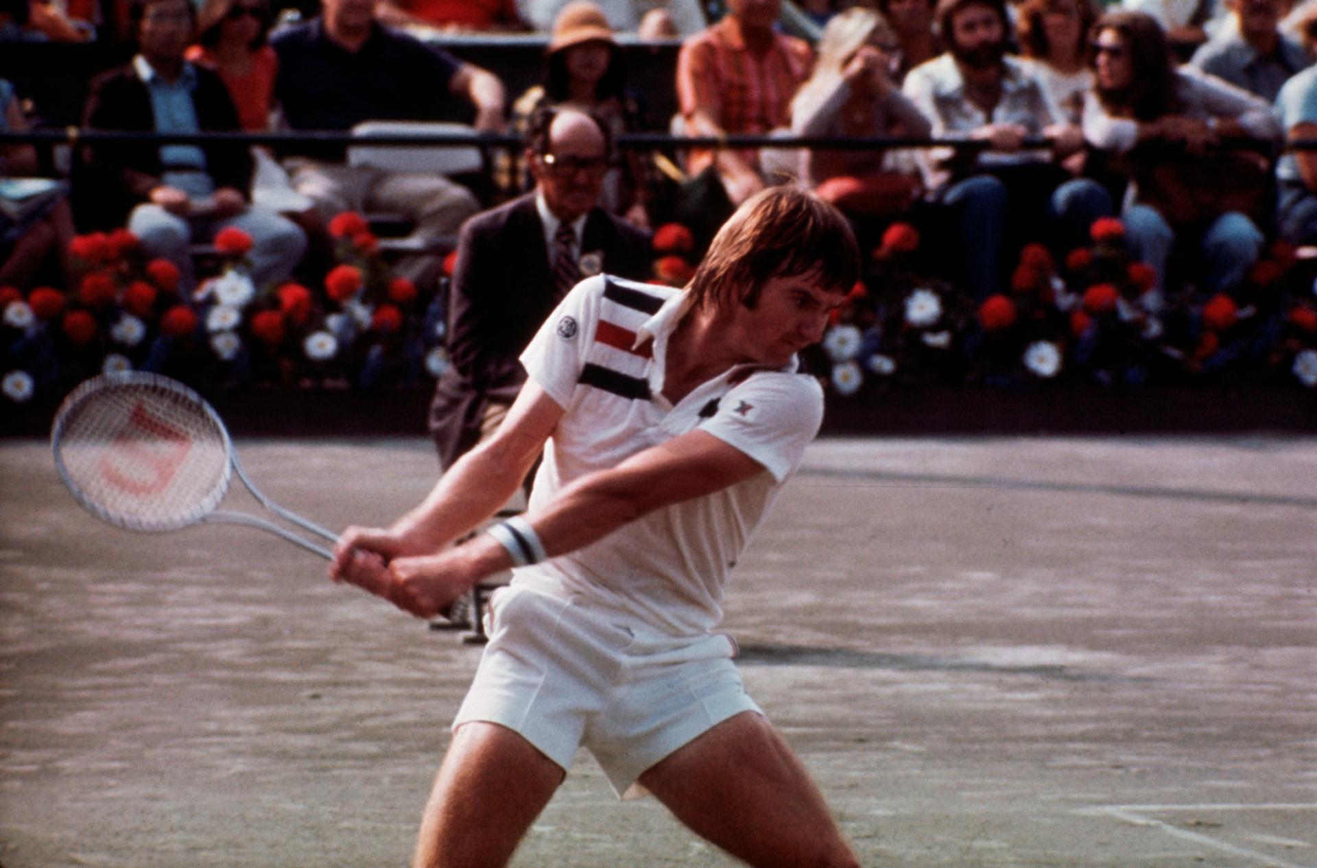 Jimmy Connors concentrates on ball as he prepares to fire two-handed return