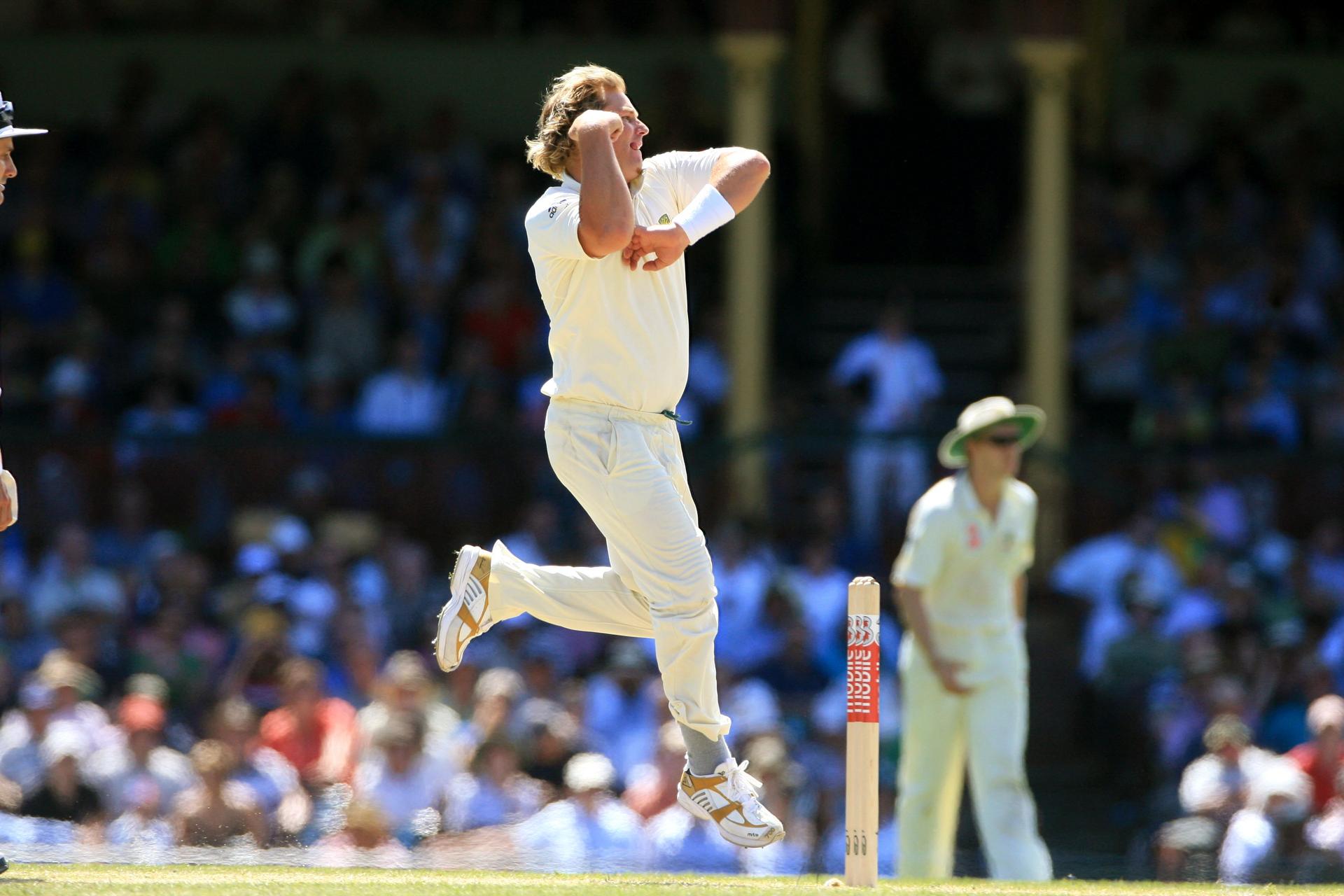 Australian spin bowler Shane Warne in action during England's 