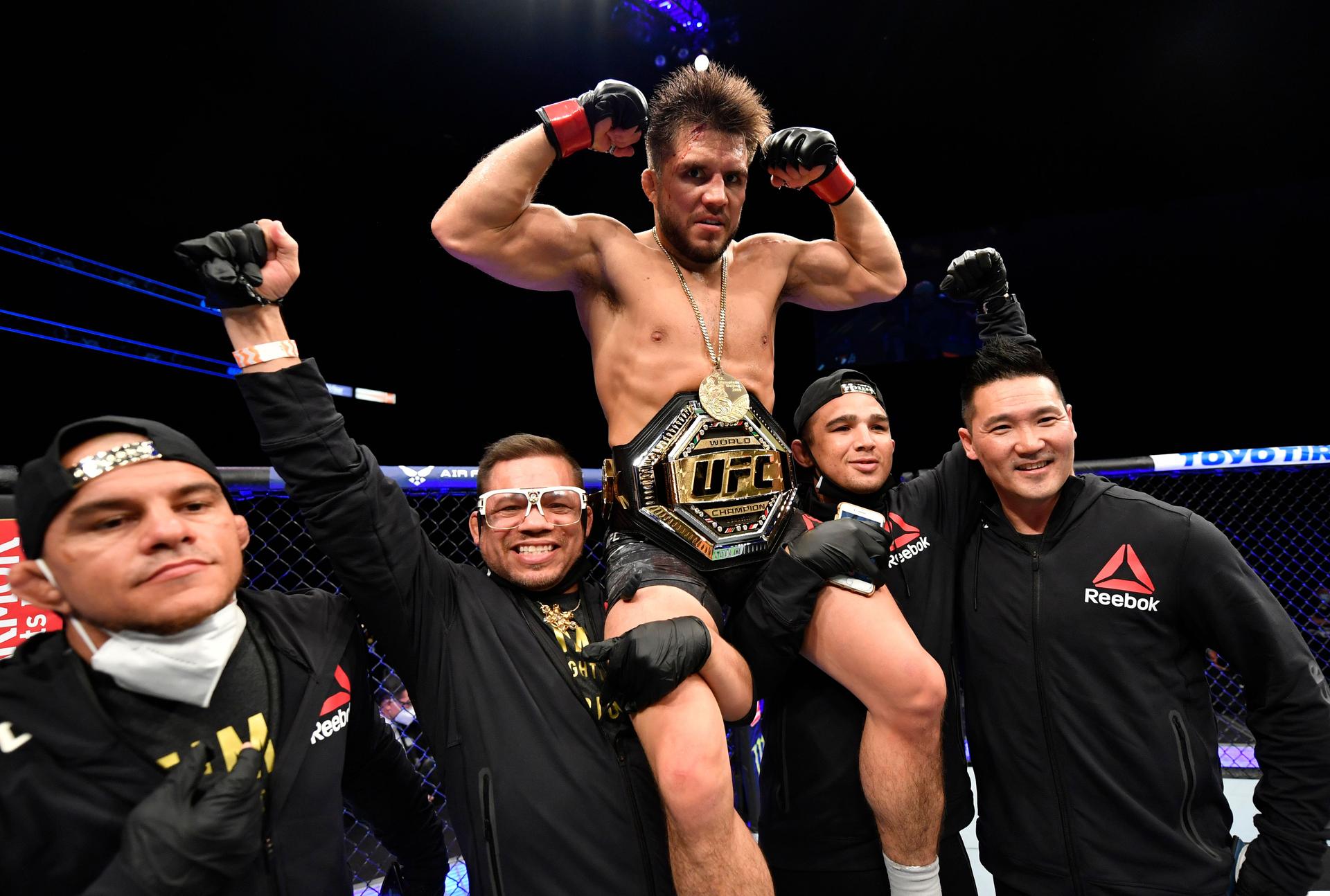 Henry Cejudo celebrating