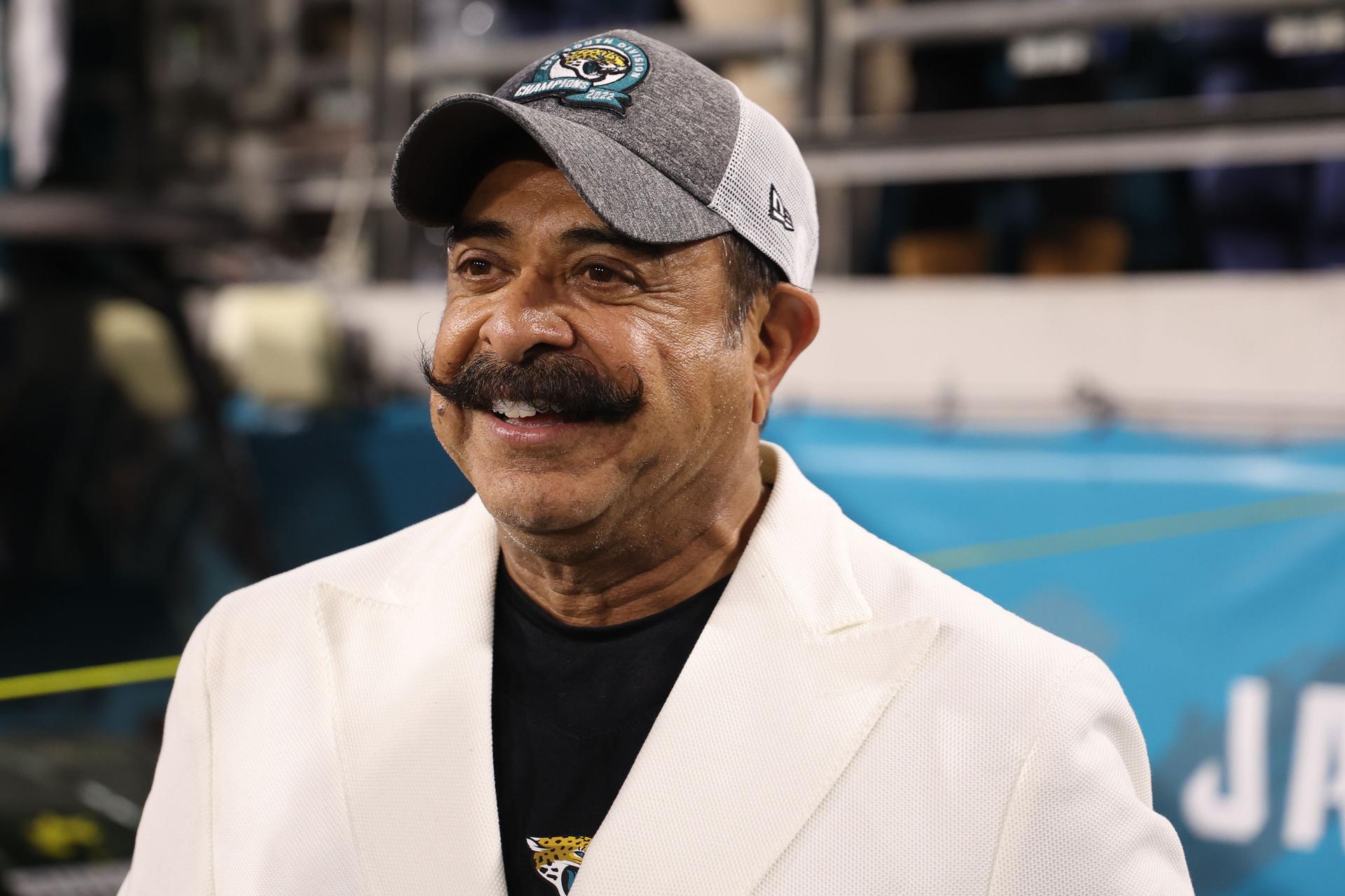 Jacksonville Jaguars owner Shad Khan celebrates after a game