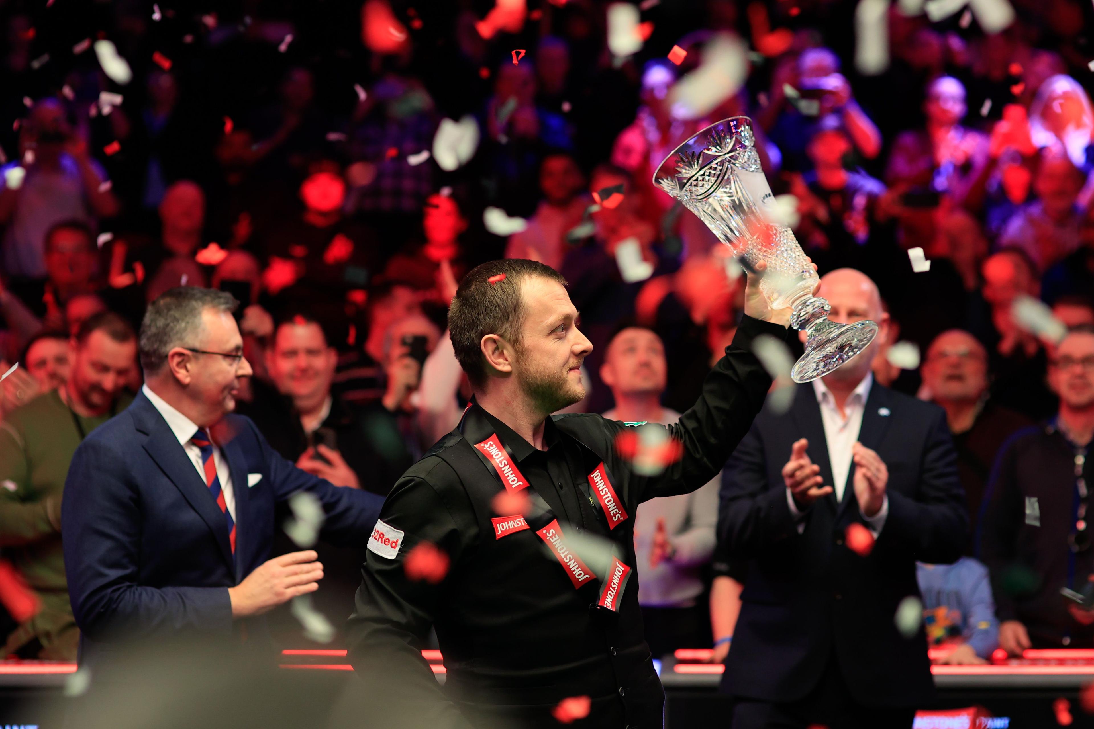 Mark Allen celebrates his 10-8 win against Zhang Anda 