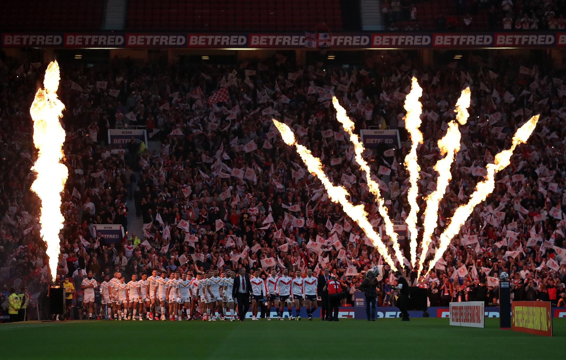 Players of both teams walk out to the field prior to the Betfred Super League Grand Final match.jpg