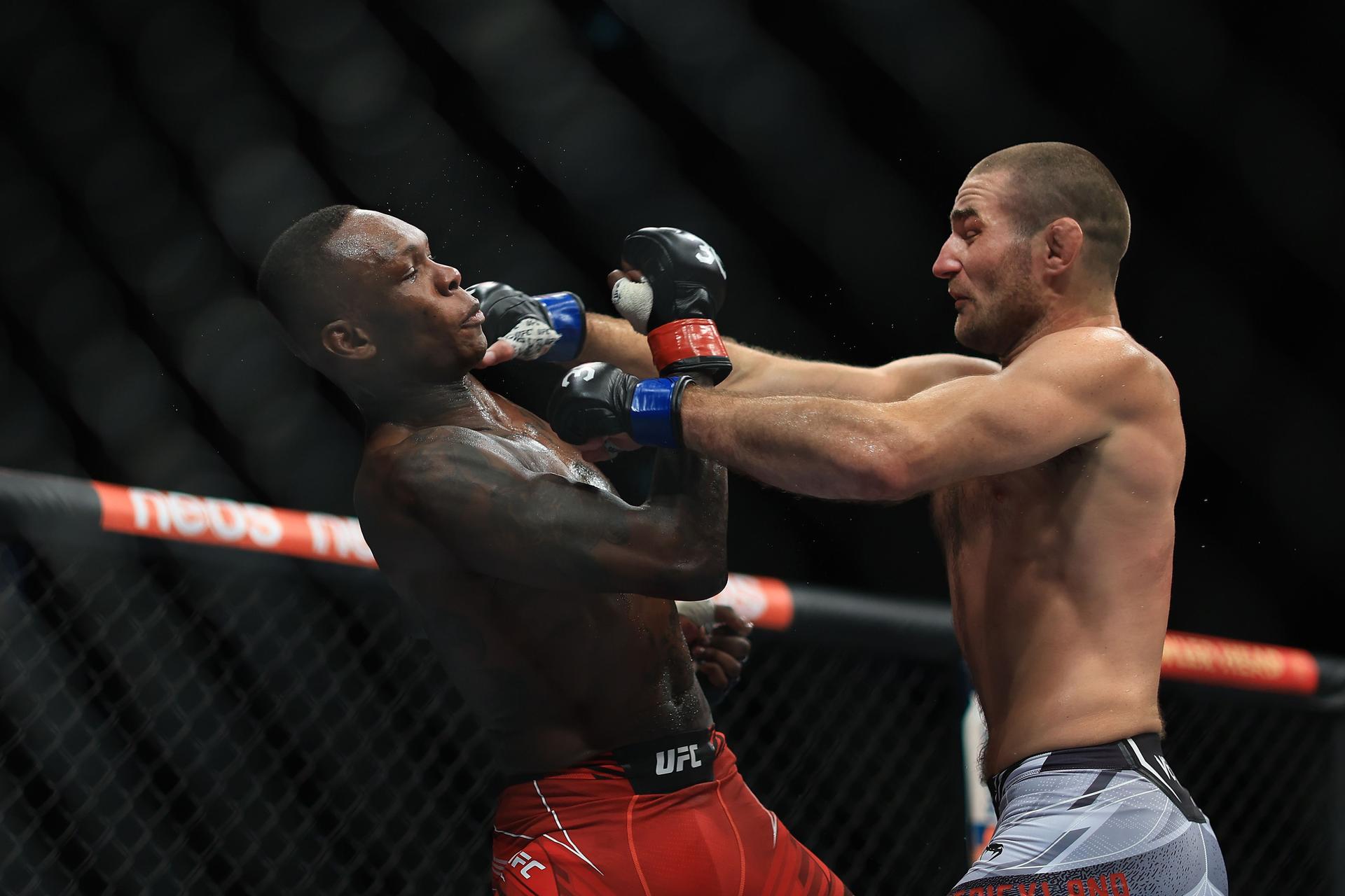  Sean Strickland and Israel Adesanya//Getty