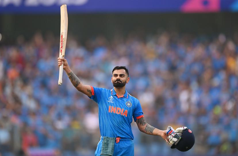 Virat Kohli of India celebrates after scoring a century,