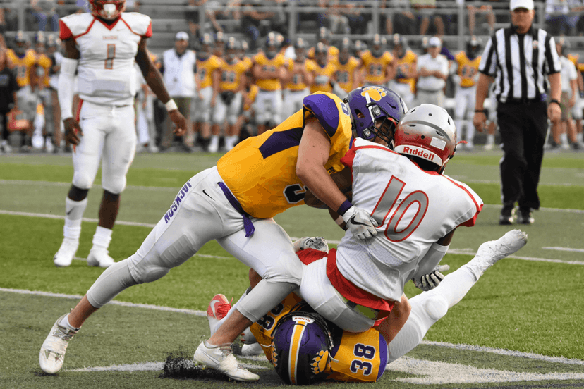 Football players in action during a game